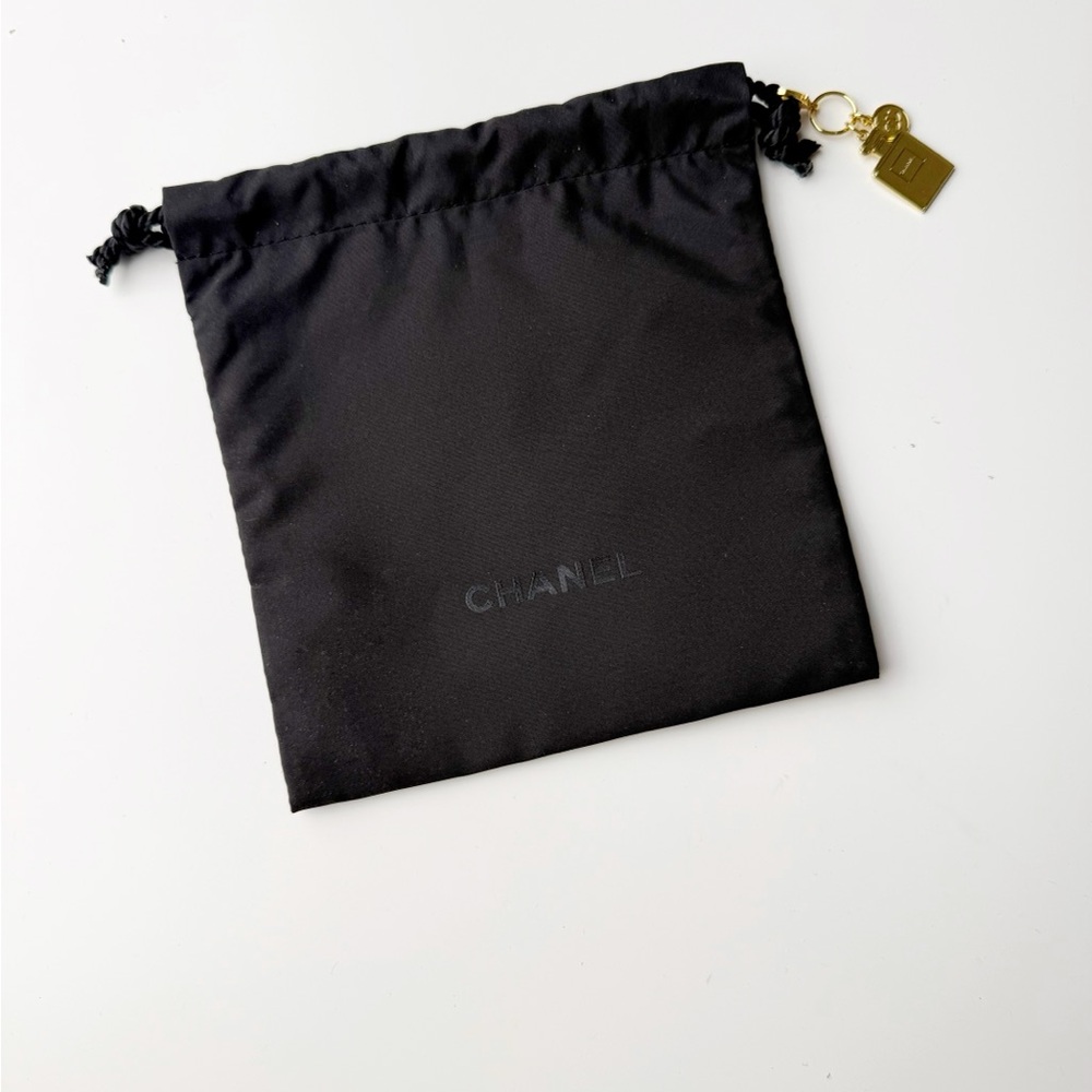 Chanel Black Drawstring Pouch With Gold Charm